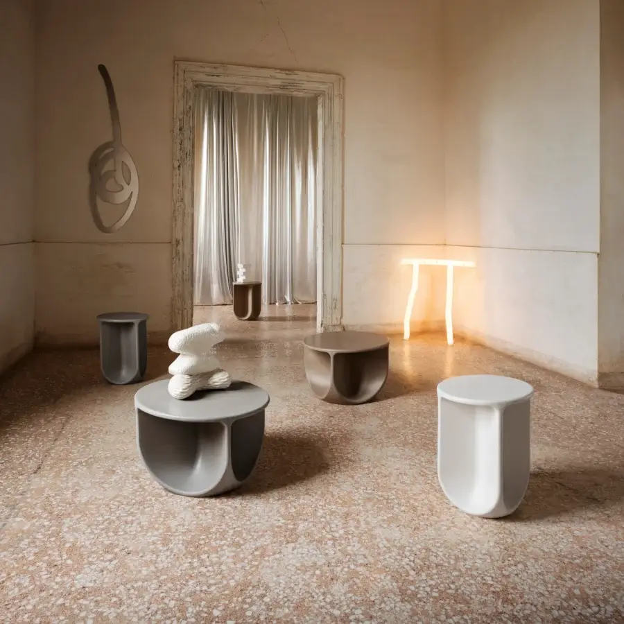 Exceptional Miniforms Pinto side table in neutral gray with fragments of marble and stone beneath a matte surface