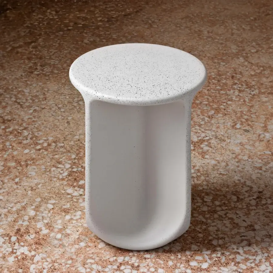 Exceptional Miniforms Pinto side table with speckled white surface and fragments of marble within its cylindrical form