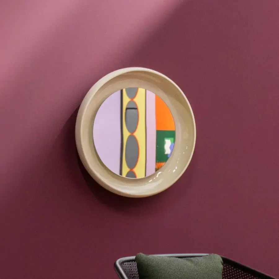 Distinguished Miniforms Coque mirror with a textured outer skin and shiny enamelled inner surface in light beige ceramic