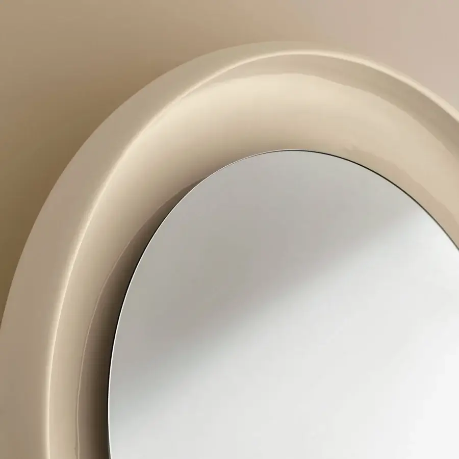 Elegant Miniforms Coque mirror with creamy beige textured exterior and shiny enamelled interior surface