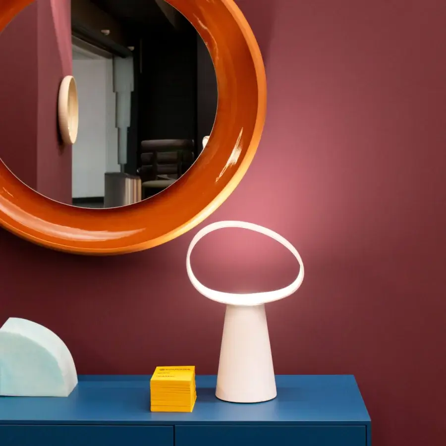 Superior Miniforms Coque mirror with a glossy orange frame and dynamic contrast in enamelled finish