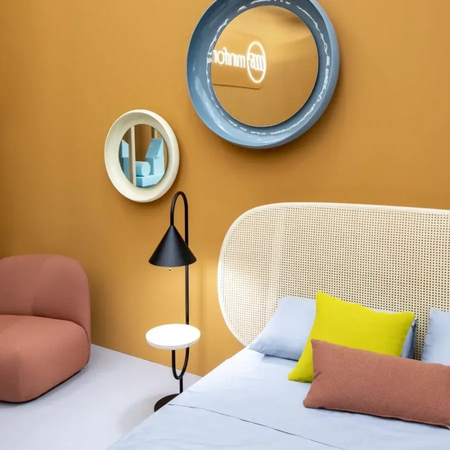 Elegant Miniforms Coque mirror with a light blue textured outer skin and shiny enamelled inner surface