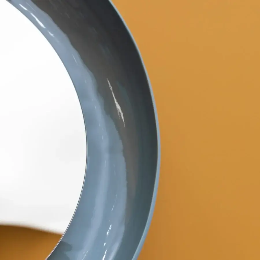 Distinguished Miniforms Coque mirror with a glossy blue-gray frame and textured outer skin crafted in Italy