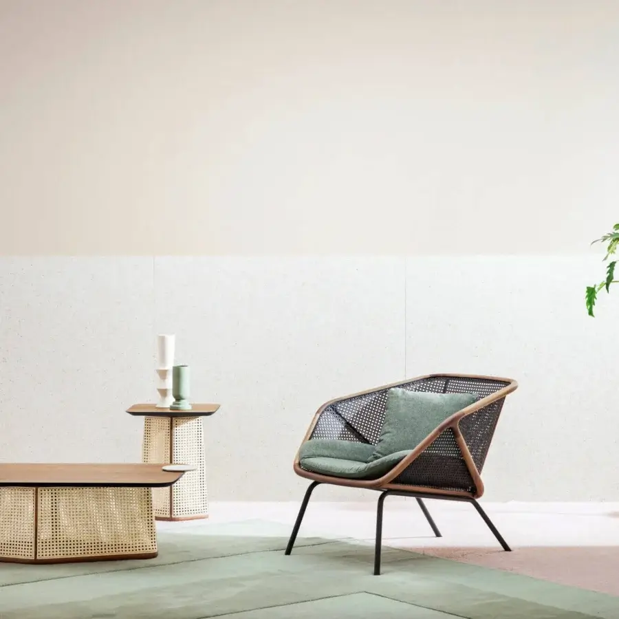 Elegant Miniforms Colony lounge chair crafted in light brown wood with woven Viennese straw and a green textile cushion