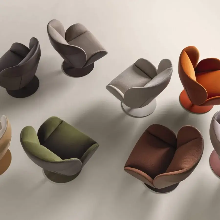 Superior Frag Ocean lounge chair with reddish-brown textile upholstery and matte finish supported by a central steel swivel base