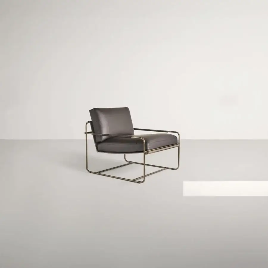 Exclusive Frag Riviera lounge chair with a metal tubular frame and hammock-shaped saddle leather sling in dark tones with a matte finish