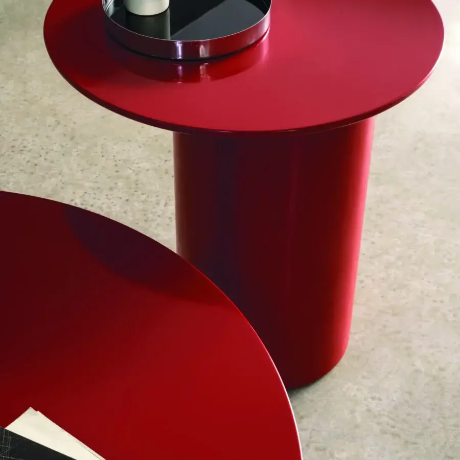 Captivating Frag Myon coffee table with a glossy lacquered finish in vibrant red and imposing cylindrical base