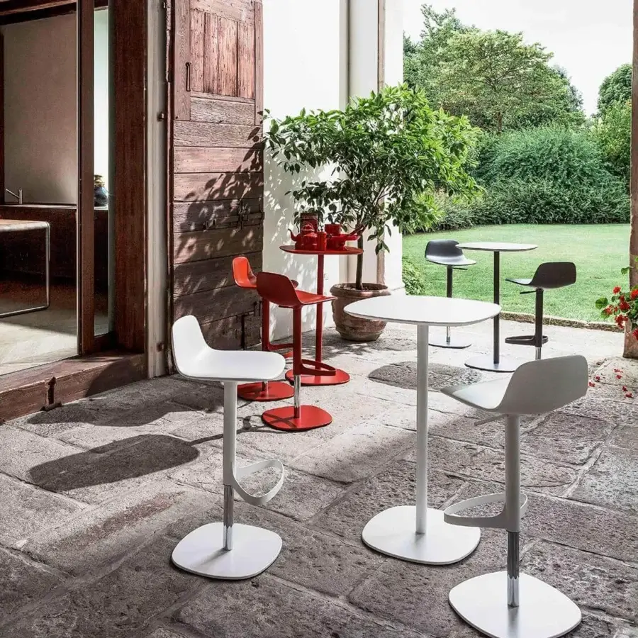 Superior Bonaldo Bonnie stool crafted from white polypropylene with a metal support base and integrated footrest