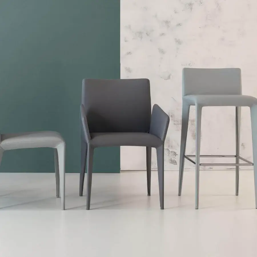 Superior Bonaldo Filly Too stool in light gray fabric with straight metal legs offering a geometric form