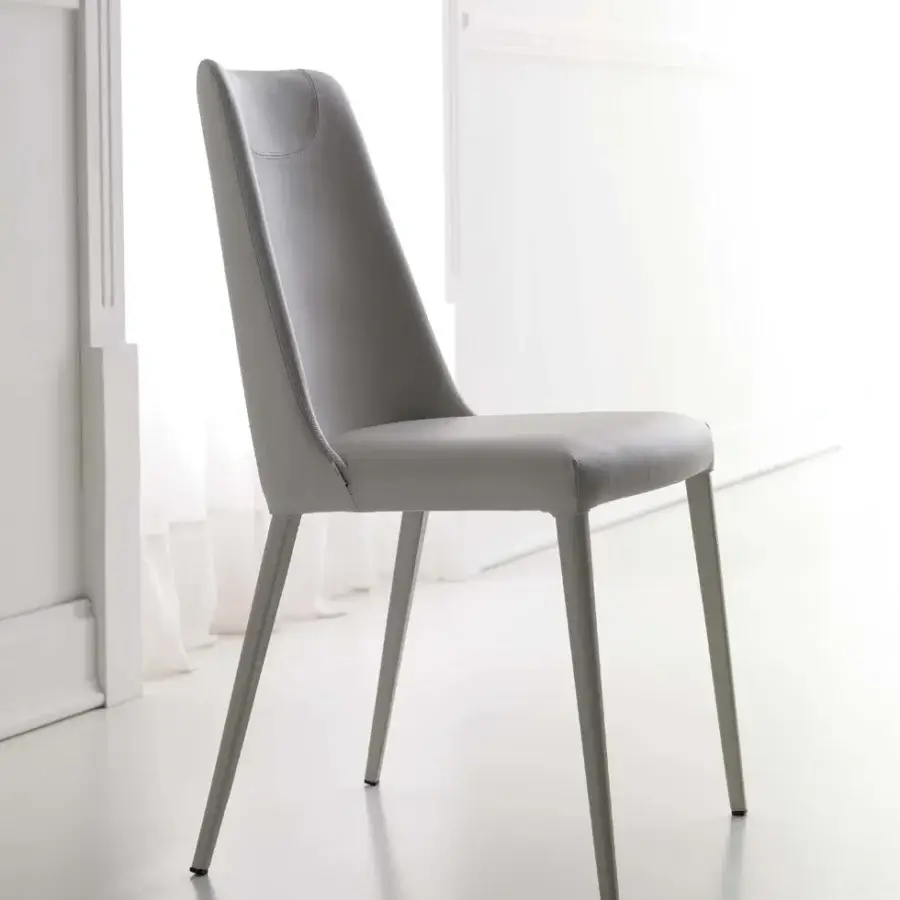 Harmonious Ozzio Italia Sofia chair fully upholstered in light gray matte material with fine back stitching