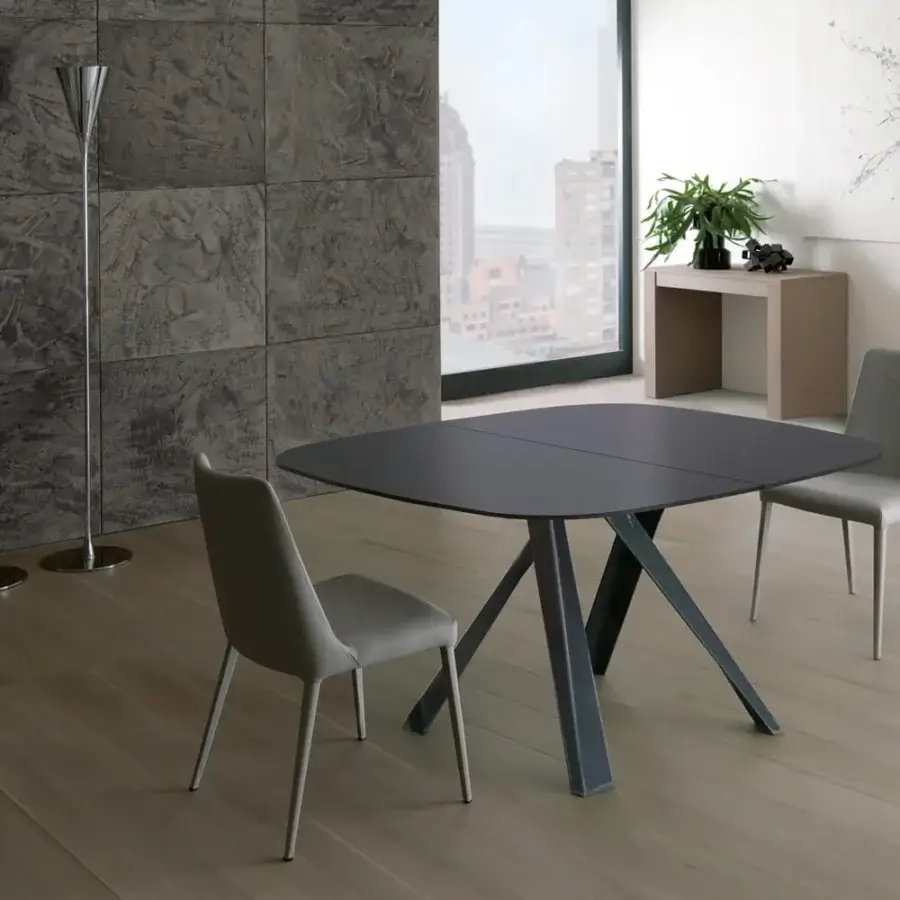 Exceptional Ozzio Italia Sofia chair fully upholstered in light grey textile with matte finish and angled metal legs