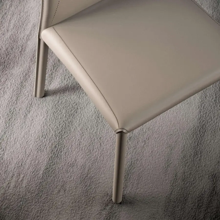 Superior Ozzio Italia Blitz chair with sinuous back and stitched border in light beige or gray matte synthetic finish