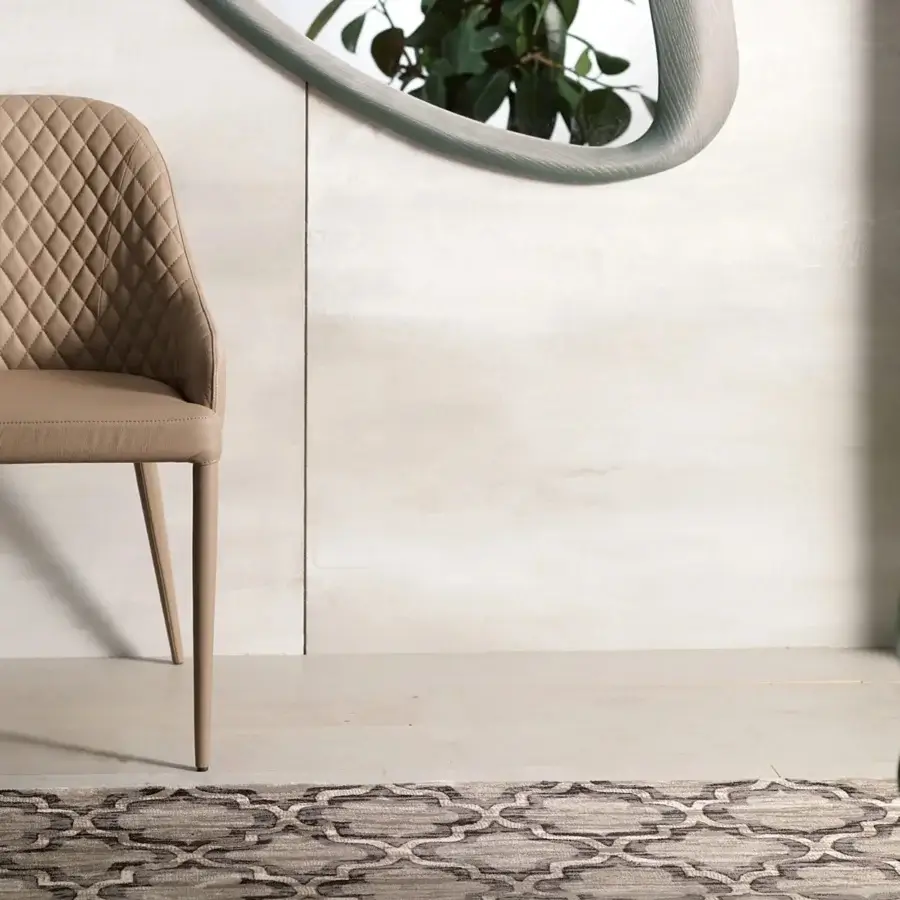 Superior Ozzio Italia Betta armchair with light brown quilted textile and haute couture seams for design care