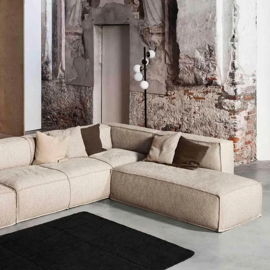 Distinguished Bonaldo Peanut sectional with light beige textile upholstery and hidden anthracite grey wood feet