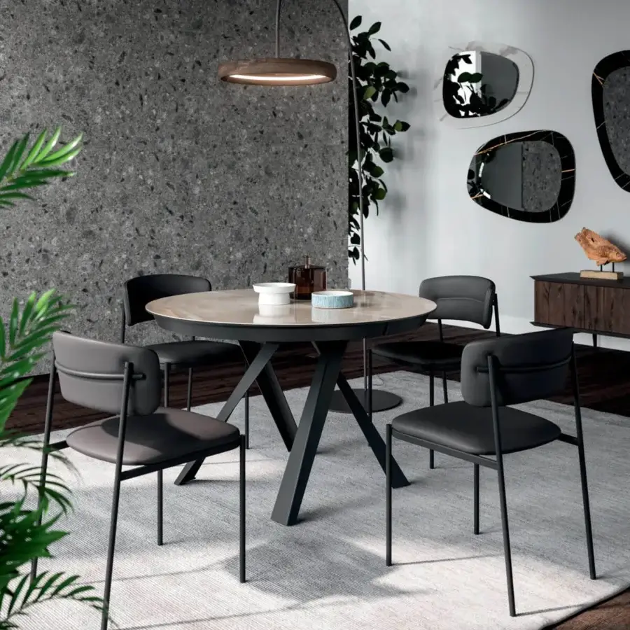 Exclusive Ozzio Italia Ego chair with black painted metal structure and black synthetic material upholstery for enveloping comfort