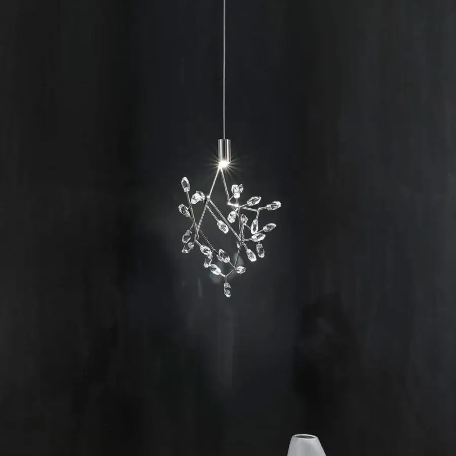 Exceptional Terzani Core suspension lamp crafted in reflective brass with faceted crystal spheres and silver finish