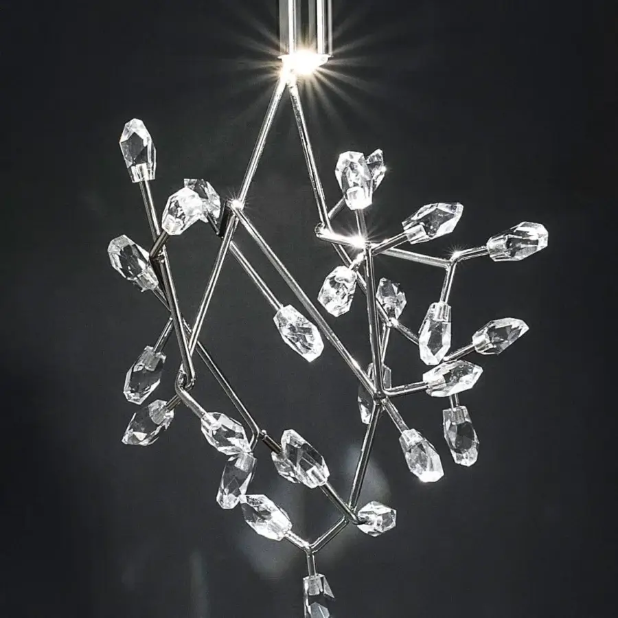 Superior Terzani Core suspension lamp crafted in polished silver with interconnected metal rods and faceted crystal diffusers