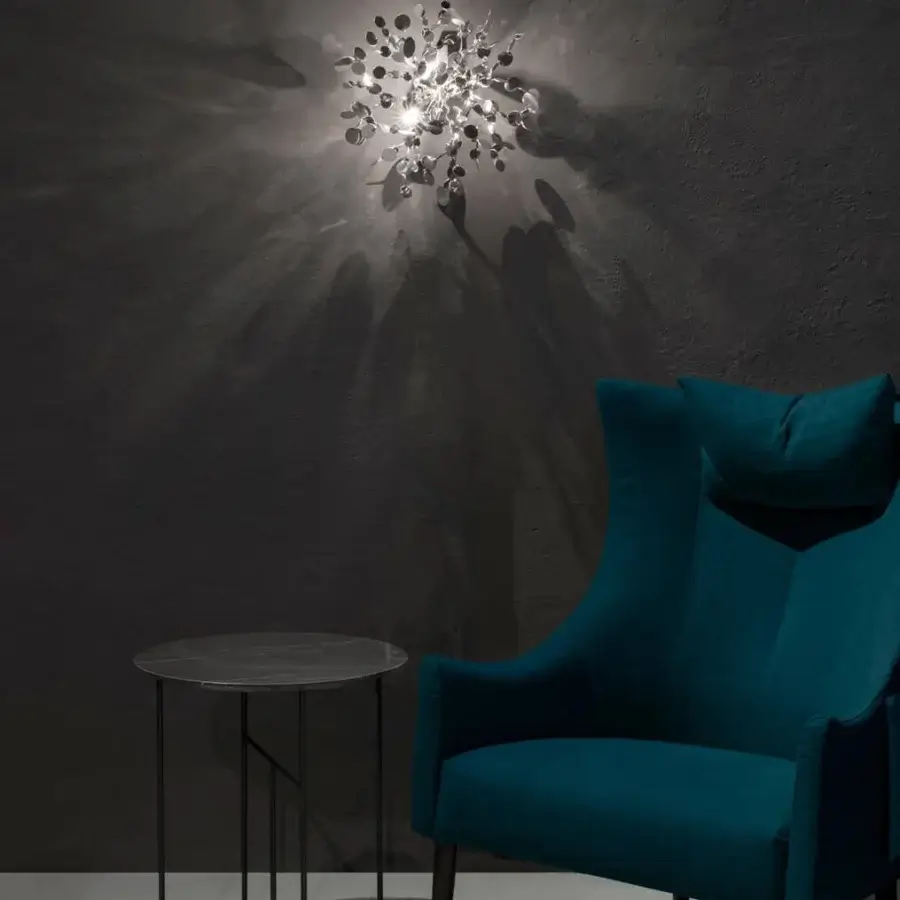 Distinguished Terzani Argent wall lamp crafted from high-end metal discs with a shimmering silver-toned reflective finish