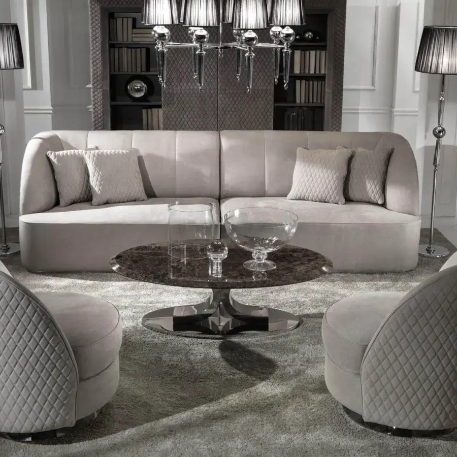 Exceptional DV Home Collection Charlotte lounge chair with light grey quilted upholstery and shining stainless steel base