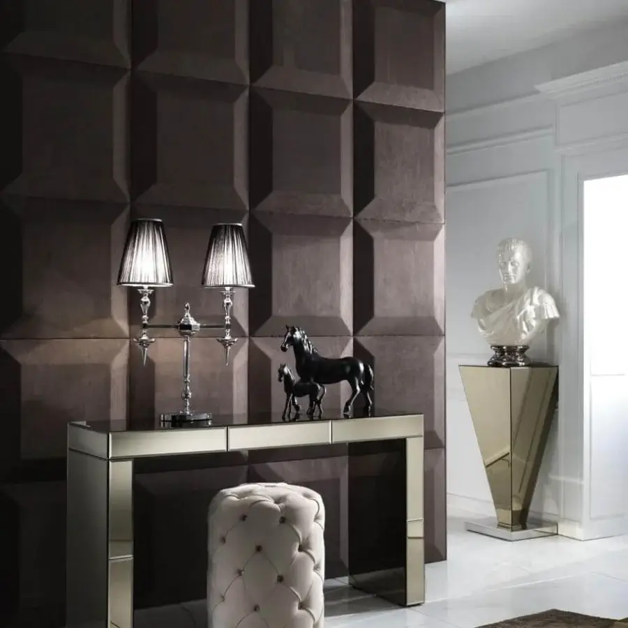 Exclusive DV Home Collection Envy Column pedestal crafted with reflective natural glass and lustrous stainless steel in gold tone