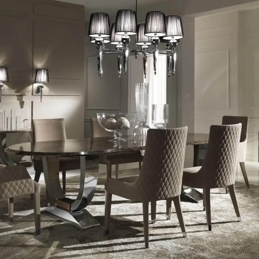 Exclusive DV Home Collection Hermes table with glossy brown marble-like top and intersecting curved stainless steel base crafted in Italy