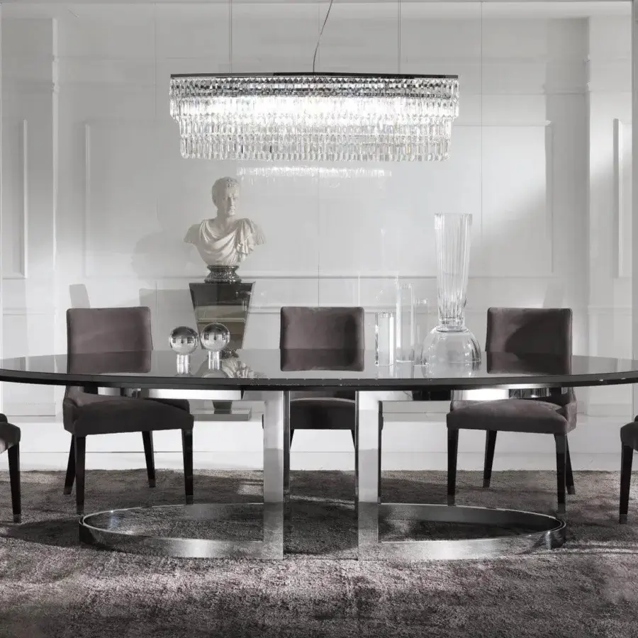 Distinguished DV Home Collection Byron chair with uniform gray textile upholstery and glossy stainless steel legs