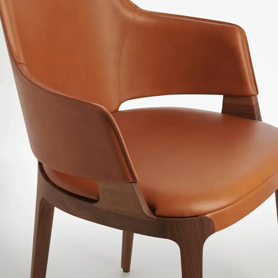 Exceptional Potocco Velis armchair with supple tan leather upholstery and meticulously crafted dark brown Canaletto walnut frame