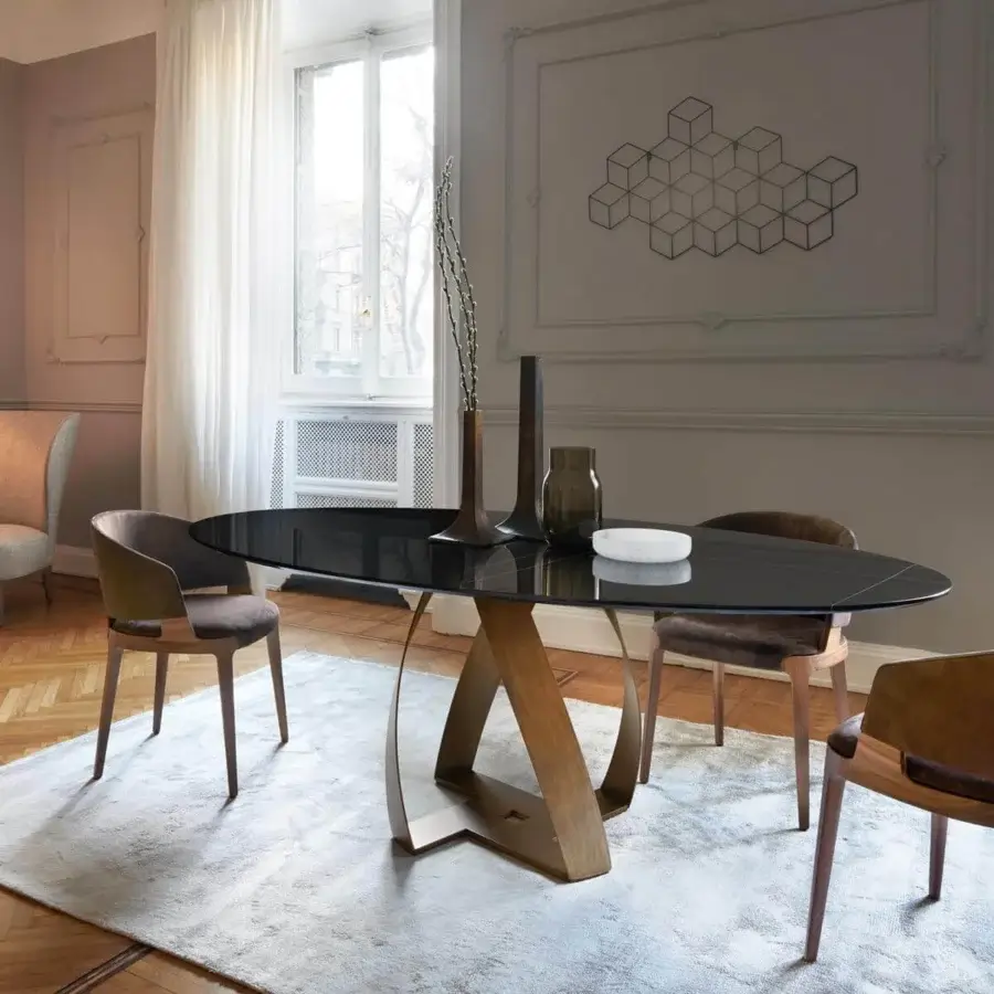 Elegant Potocco Velis armchair with curved brown textile upholstery and visible ash wood frame