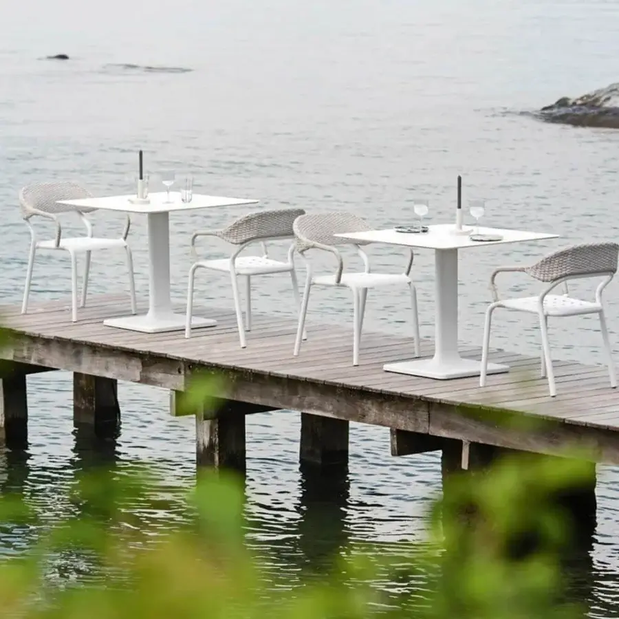 Exceptional Varaschin Noss armchair crafted with aluminum and hand-woven white polypropylene rope in a matte finish