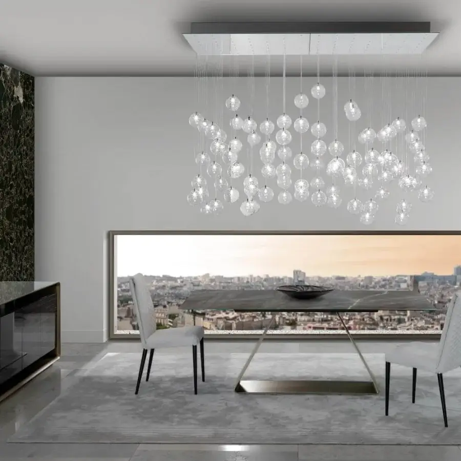Exceptional Reflex Oh table with dark stone-like Marble glass top and glossy bent metal base crafted in Italy