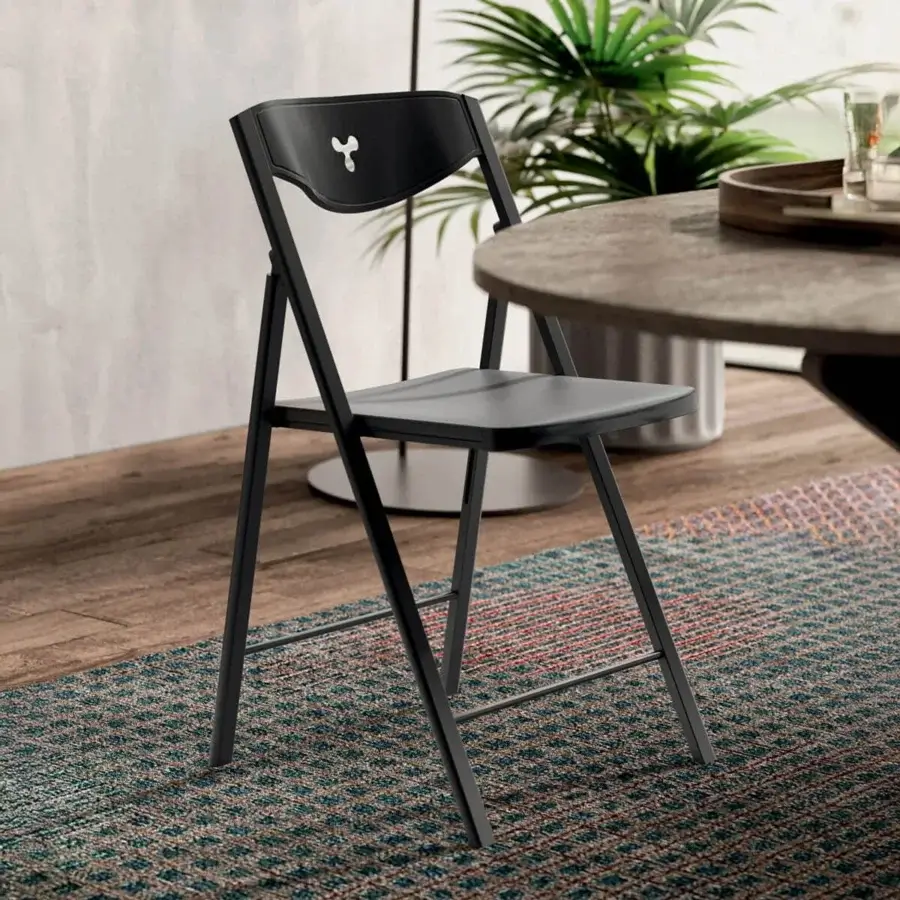Elegant Ozzio Italia Plio chair with black metal structure and polypropylene seat and backrest crafted in Italy