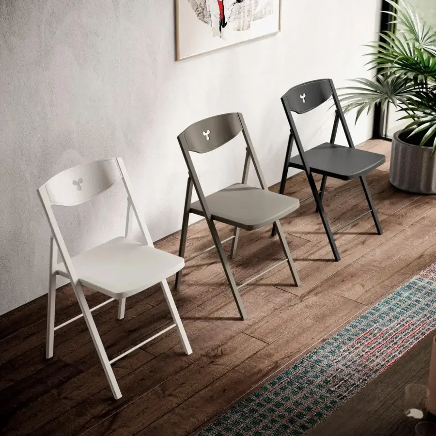 Superior Ozzio Italia Plio chair with dark gray polypropylene seat and matte metal structure