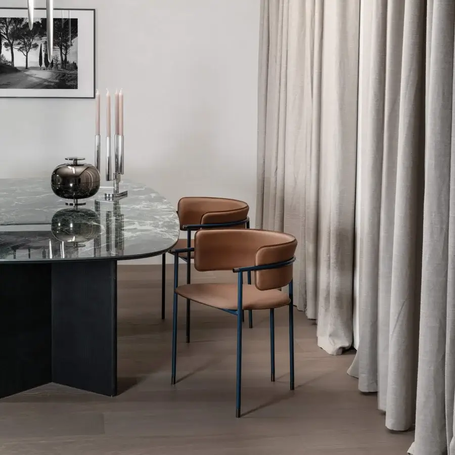 Innovative Cierre1972 Mac armchair with sleek metal frame and supple tan leather upholstery crafted in Italy