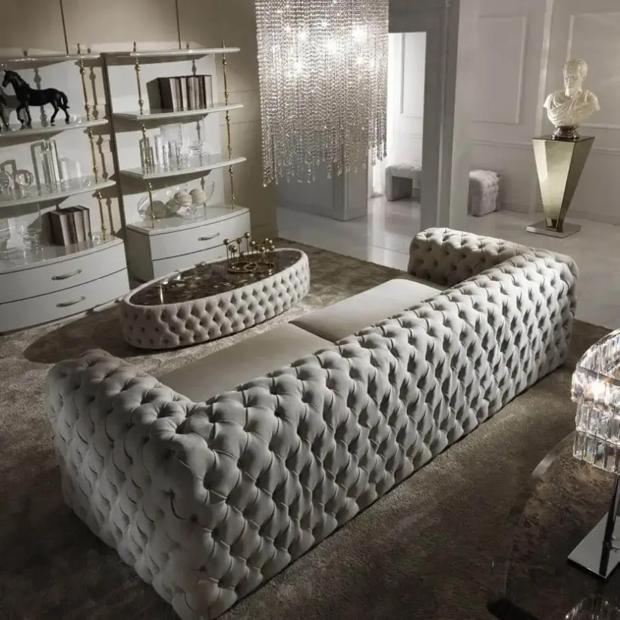 Sophisticated DV Home Collection Chelsea sofa with light gray soft-textured tufted fabric and solid wood structure