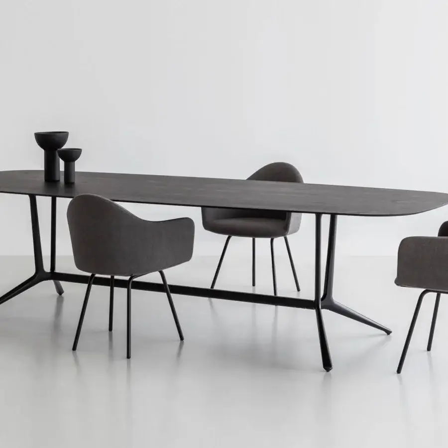 Superior Lapalma Trail conference table with a dark stained wood top and black powder-coated aluminum base with zoomorphic legs