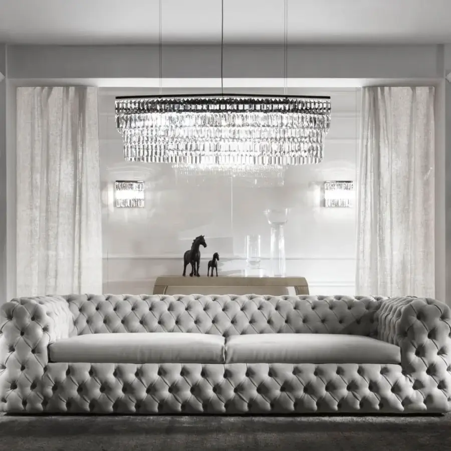 Lavish DV Home Collection Chelsea sofa with light gray plush tufted textile and solid wood frame construction