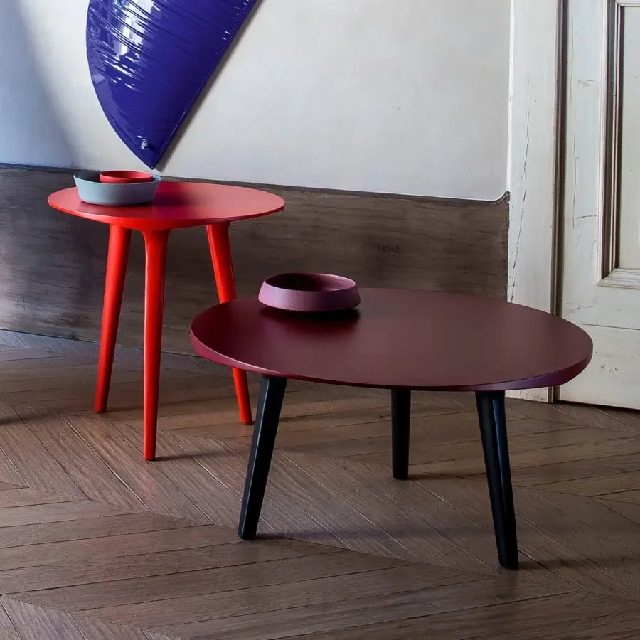 Refined Bross Ademar side & coffee table with lacquered black legs and matte dark burgundy circular top crafted in Italy