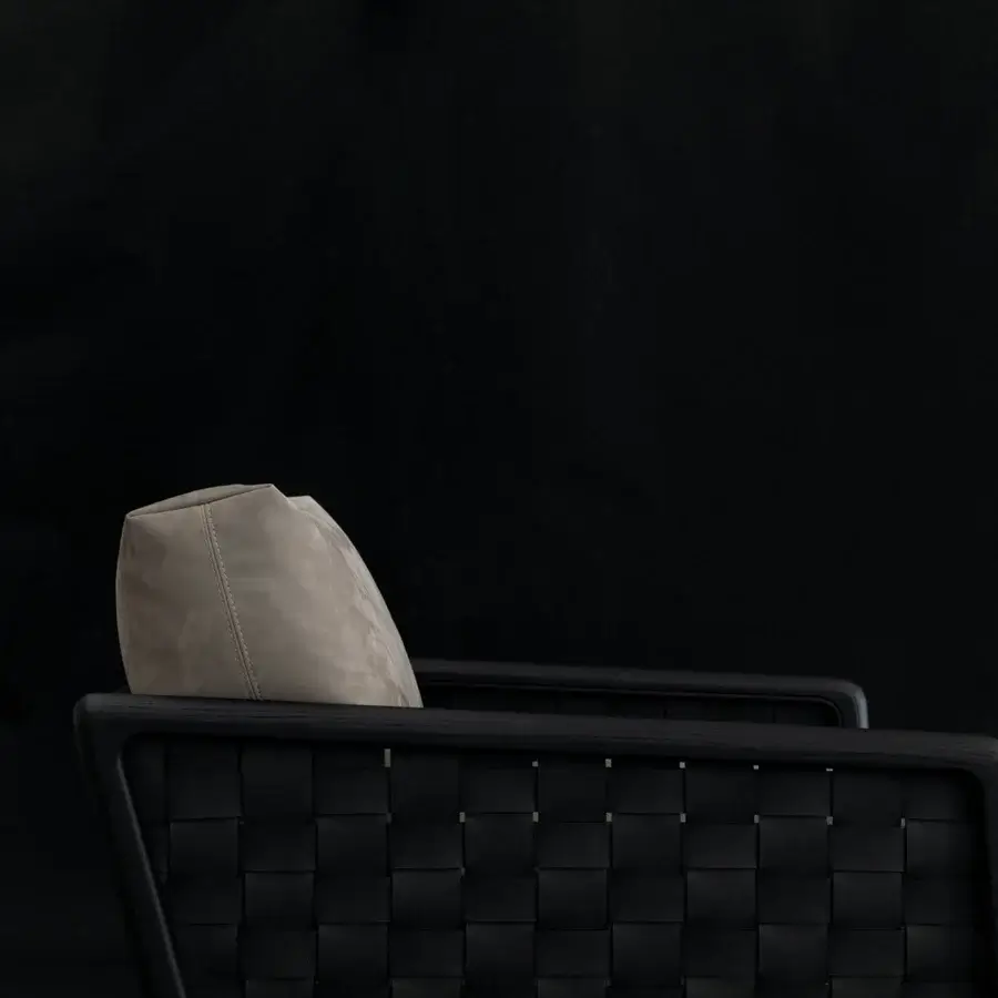Exceptional Cierre1972 Iole lounge chair with woven seating and light gray textile cushion in dark matte wood