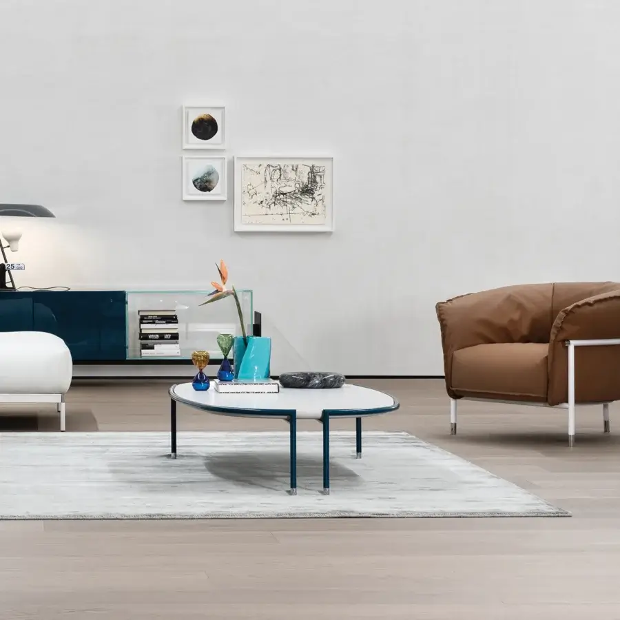 Harmonious Cierre1972 Mac lounge chair with brown leather upholstery and sleek white metal frame crafted in Italy