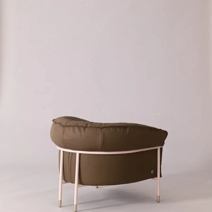 Exceptional Cierre1972 Mac lounge chair with olive green leather upholstery and light pink powder-coated metal built with a matte finish