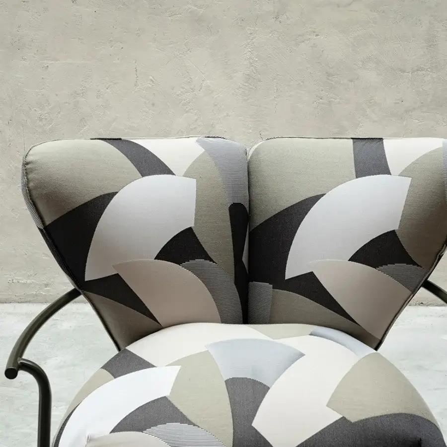 Distinguished Cierre1972 Gina lounge chair with geometric gray, beige, and black textile and matte metal frame