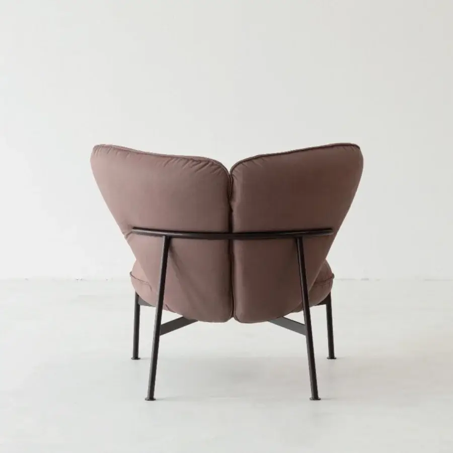 Superior Cierre1972 Gina lounge chair with organic form and muted brown matte textile upholstery