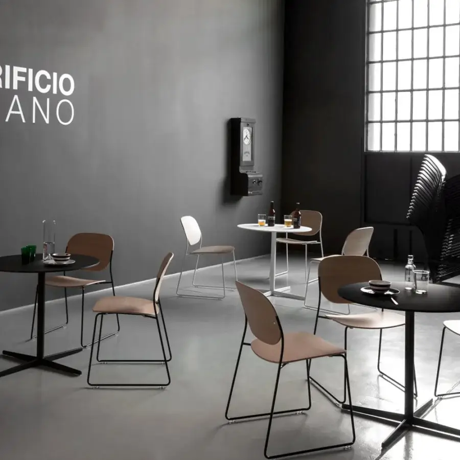 Distinguished Lapalma Auki bistrot table with sleek lines and matte black laminate tabletop supported by powder-coated metal and die-cast aluminum base