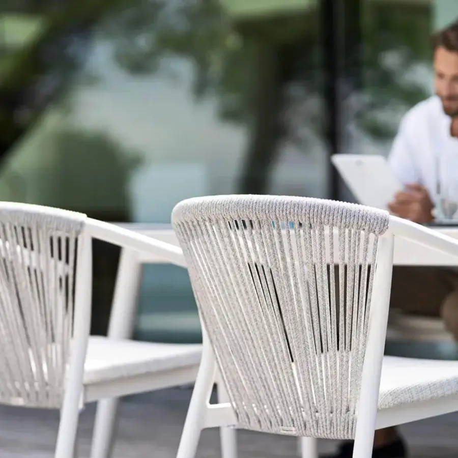 Exceptional Varaschin Smart armchair with light gray VAR#TEX PVC mesh and woven VAR#TEX synthetic rope back in a matte finish