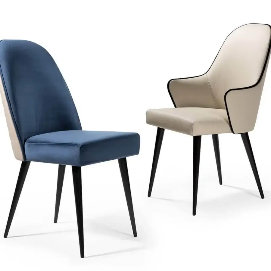 Exceptional Reflex Ludwig chair with light cream textile upholstery and tapered black legs