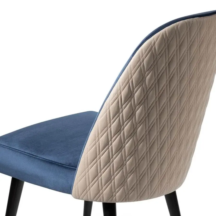 Superior Reflex Ludwig chair with blue velvet-like upholstery and tan diamond-quilted back built with dark wood legs and matte finish