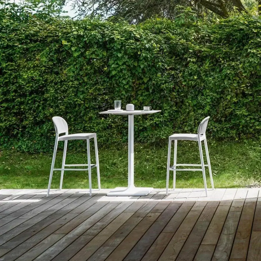 Distinguished Varaschin Plinto bar table with geometric forms in crisp white HPL and sleek aluminum base boasting a matte finish