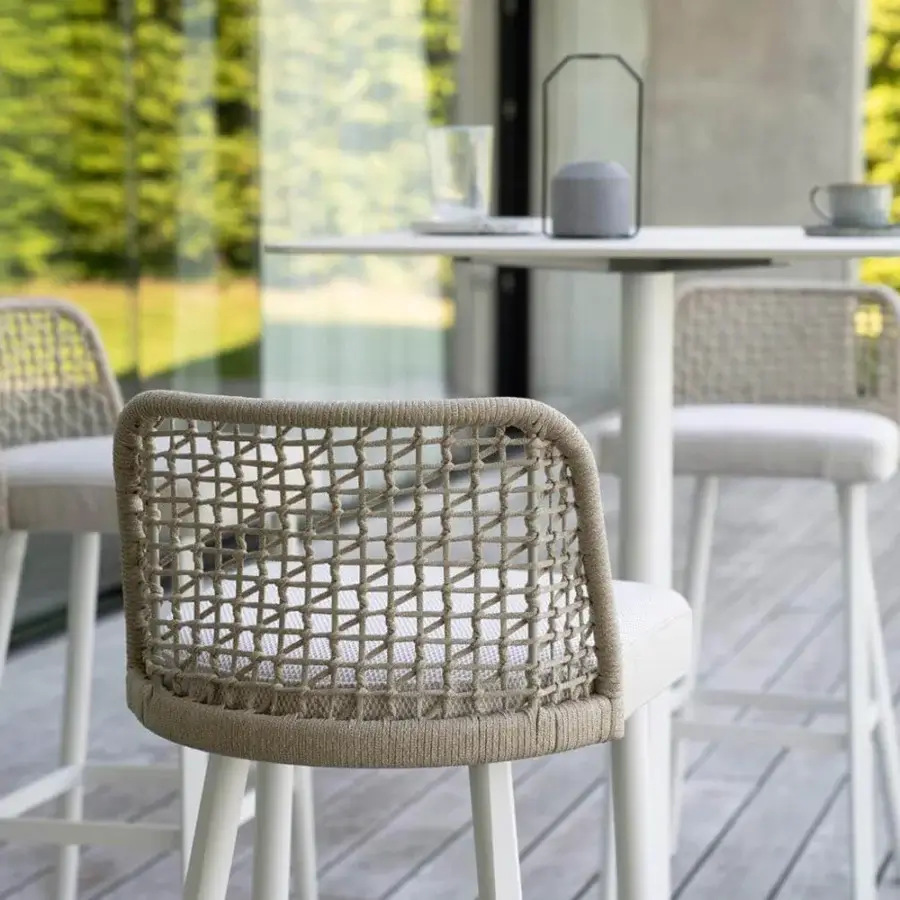 Superior Varaschin Emma stool with light upholstery and distinctive woven rope back in matte white finish