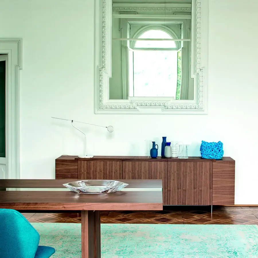 Distinguished Bross Ava chair with turquoise fabric upholstery and matching lacquered metal legs crafted in Italy