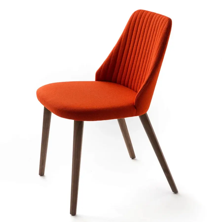 Superior Bross Break chair with quilted orange fabric upholstery and sleek dark-toned wooden legs